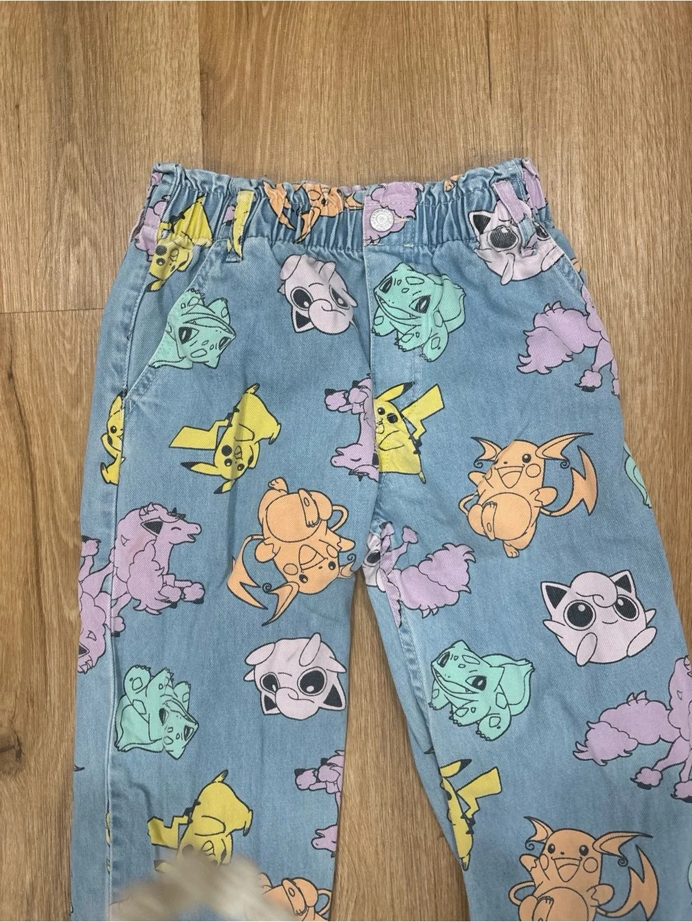 H&M Pokémon Print light denim relaxed fit paper bag Jean. Size 10